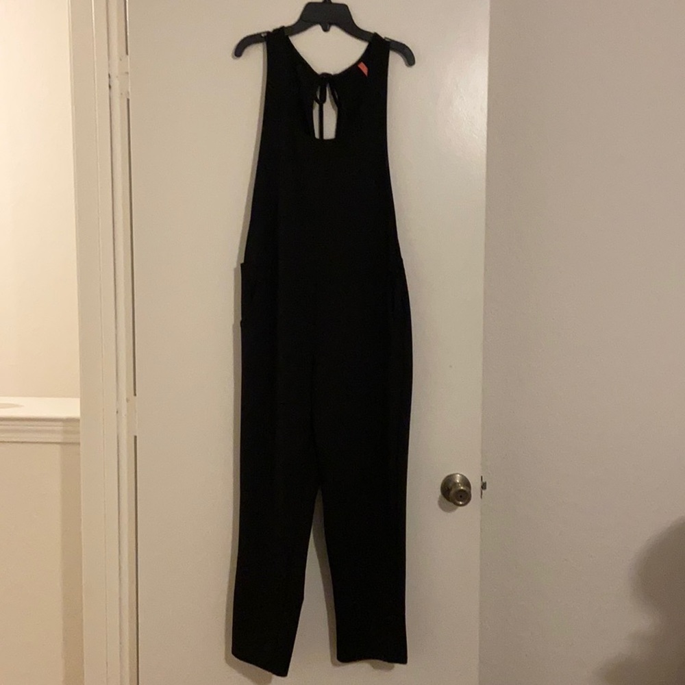 Jumper with open back and sides. NWOT